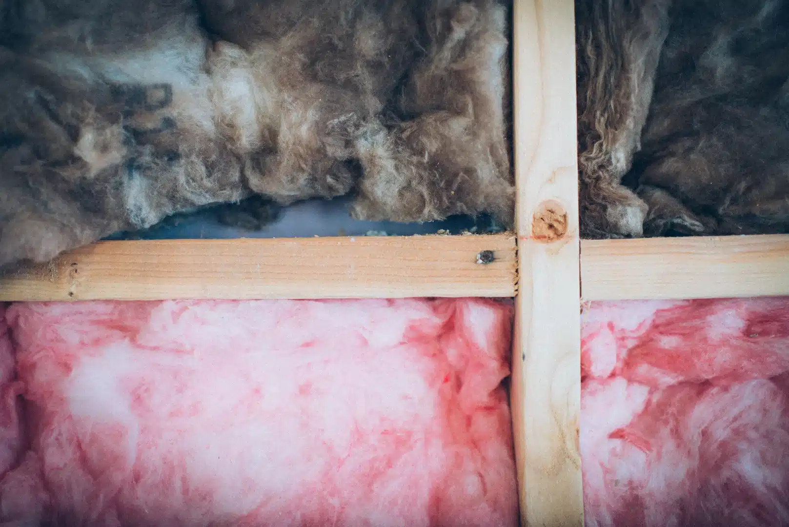 Insulation installed between wooden wall framing